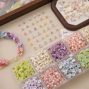 Colorful resin flower pendants with gold rings for DIY bracelet making and jewelry crafts