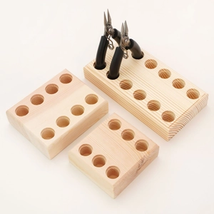 Handcrafted solid wood pliers organizer rack set with multiple holes for tool storage