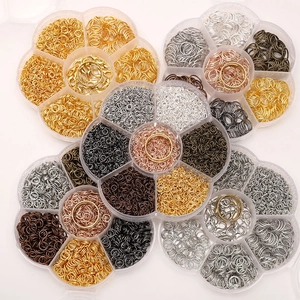 7-grid DIY jewelry findings set with lobster clasps and jump rings in flower containers