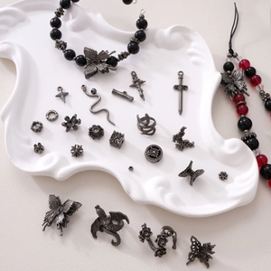 Gothic style alloy charms and beads featuring dragon and rose designs for DIY jewelry making
