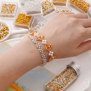 Handmade beaded bracelet set with gold silver glass seed beads and flower charms