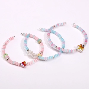 Colorful 4x2.5mm cat eye glass donut beads set with floral charms for DIY jewelry making