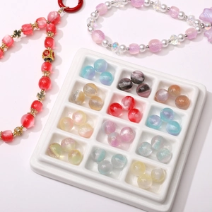 DIY jewelry kit with 10mm resin beads in 12 colors and decorative finished bead strings