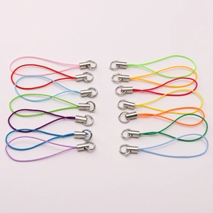 Close-up of colorful braided polyester phone lanyards with metal lobster clasps and rings