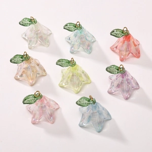 Macro view of eight colorful acrylic lily of the valley pendants for DIY jewelry making
