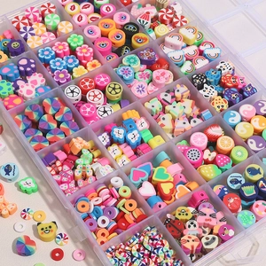 24-compartment storage box with assorted colorful polymer clay beads for DIY jewelry making