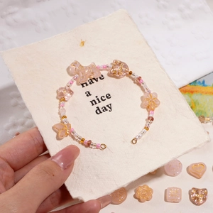 Pink heart and butterfly glass bead charms for DIY jewelry making and handmade bracelets