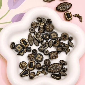 Vintage black and gold acrylic charms in various shapes for DIY jewelry making
