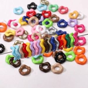 Colorful wave-shaped acrylic spacer beads with glossy cream texture for DIY jewelry making