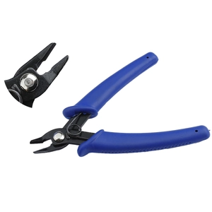 Detail of blue handle jewelry pliers with precision tip and spring return for DIY crafting