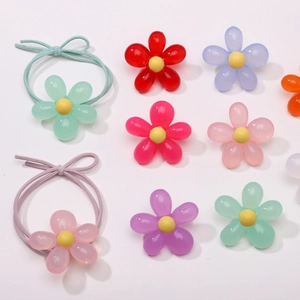Flat lay of colorful acrylic tulip beads for DIY jewelry and keychain accessories