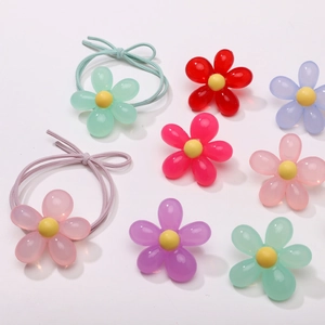 Close-up of colorful 12x10mm acrylic tulip beads with smooth gradient for DIY crafts