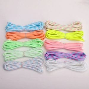 Close-up of 4mm 7-strand luminous paracord bundles in various vibrant colors