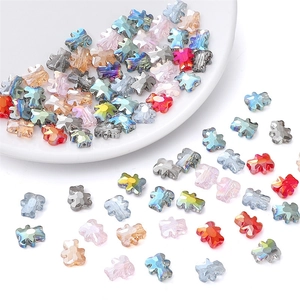 Macro view of multi-color bear shaped faceted crystal glass beads for DIY jewelry making