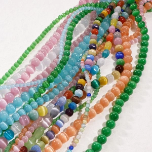 Macro detail of colorful cat-eye stone beads for DIY jewelry bracelets and necklaces