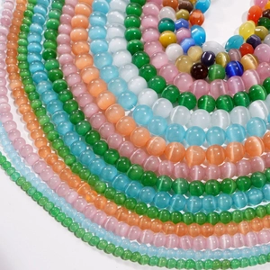 Various sizes of colorful cat eye glass beads for DIY jewelry making in multiple colors