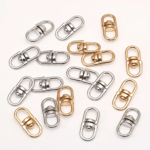 Macro view of 8x19mm alloy swivel lobster clasps in polished gold and silver finishes