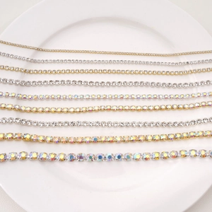 Detailed comparison of sparkling crystal rhinestone claw chains in gold and silver finish