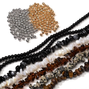Detailed collection of irregular natural stone beads and metal accents for DIY jewelry making
