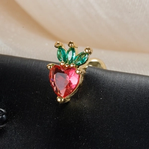 Macro view of strawberry stud earring with red heart zircon and green marquise stones