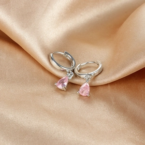 Macro shot of S925 sterling silver stamp on pink teardrop zircon dangle earrings