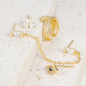 Goldenes Evil Eye Ohrring-Set mit Quastensteckern, Zirkoniasteinen und Ohrmanschetten
