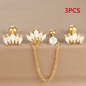 Detailansicht eines 3er-Sets Goldohrringe mit Marquise-Zirkonia-Kronen und Kettenquasten