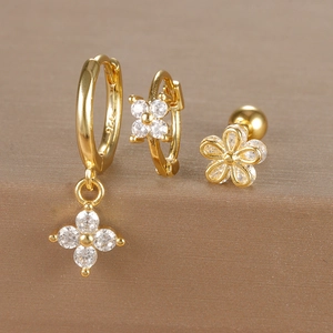 Close-up of S925 sterling silver gold-plated flower earrings set with micro-inlaid zircon