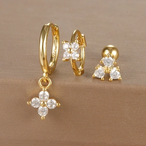 Detail view of 925 sterling silver gold earrings with zircon flowers and macro hallmarks