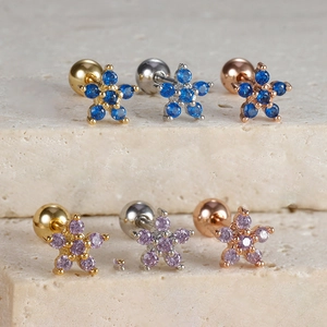 Floral stainless steel cartilage stud earrings with sparkling blue and purple crystals