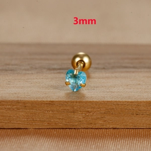Macro detail of 3mm sky blue heart zircon earring with gold stainless steel screw ball back