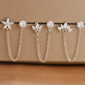 Roestvrijstalen dubbele piercing oorbellen set met ketting, ster en zirkoon