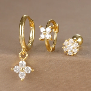 Close-up of gold-plated silver jewelry set with zircon floral earrings and S925 hallmark
