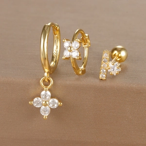 Detailed view of S925 silver four-leaf flower earrings set with sparkling zircon stones