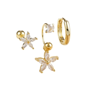 Set di tre orecchini dorati in zircone con borchie a stella e cerchio minimalista