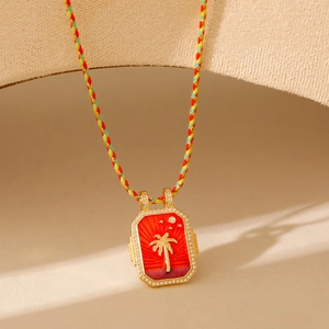 Collier tarot palmier doré avec cristaux et cordon en corde tressée colorée