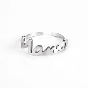 Close-up of adjustable silver Mama letter ring with minimalist script design