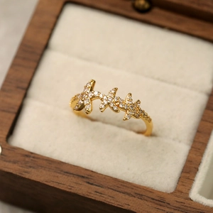 Bague étoile de mer dorée à l'or 18 carats avec micro-pavé de zircones pour femme