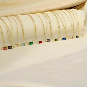Gold stainless steel birthstone necklace with minimalist rectangle zircon pendant