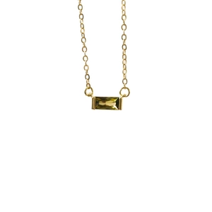 Minimalist gold stainless steel necklace featuring a green rectangular birthstone pendant