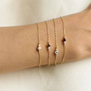 Vintage style gold bracelet set with pearls and December birthstones for women