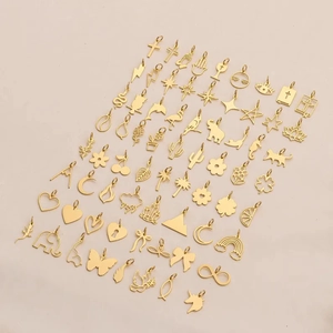 Pendentifs en acier inoxydable plaqué or 18K avec croix et papillon pour création de bijoux