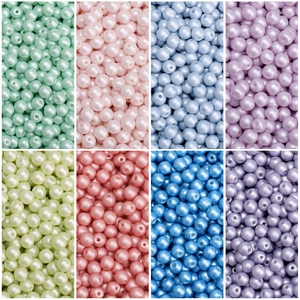 Macro detail of 4mm glass pearls in eight vibrant colors for DIY jewelry making and beading