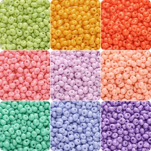 Macro view of 5mm multi-color seed beads showing smooth texture for DIY jewelry making