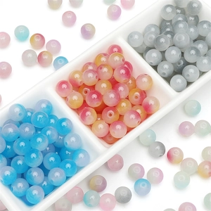 Translucent glass beads in blue and pink for DIY jewelry making and crafts
