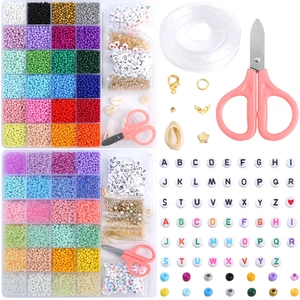 Macro view of 24-grid DIY jewelry kit with colorful seed beads and letter beads