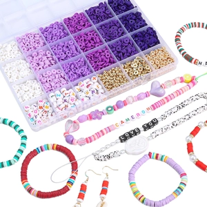 DIY jewelry making kit with purple polymer clay beads and alphabet charms in 24 grids