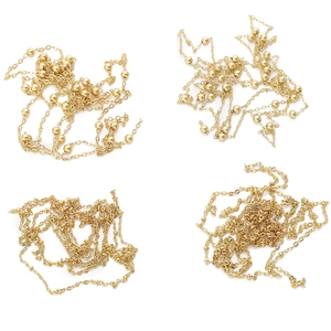 Golden copper DIY jewelry chains with decorative beads for handmade necklaces and bracelets