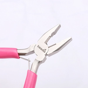 Close-up of pink handle jewelry pliers with brand logo and spring mechanism