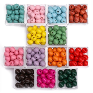 Set of colorful painted wooden beads in 13 vibrant colors for DIY jewelry making and crafts